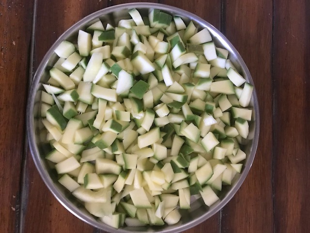 mango pickle or avakaya recipe made with unripe green mangoes
