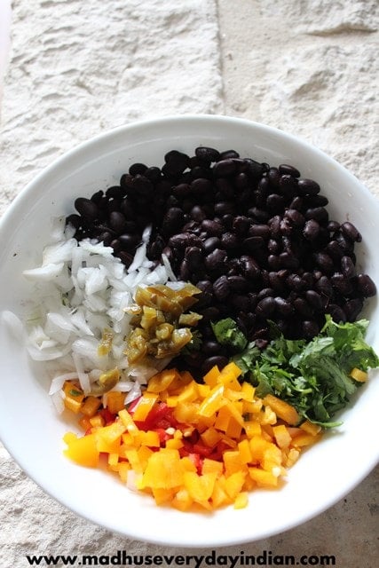 Healthy black bean salad recipe- easy and healthy black bean salad ready in ten minutes. Serve it as a salad or as a side with the main course side or as a dip with tortilla chips.