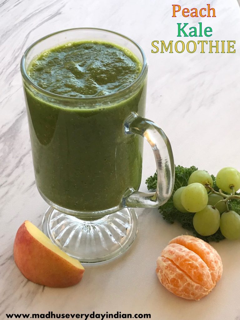peach kale green smoothie with orange and green grapes