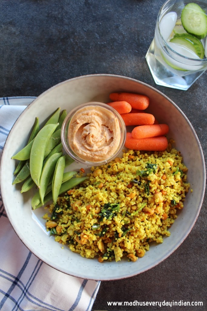 lemon millet rice served with baby carrot, snap peas and hummus