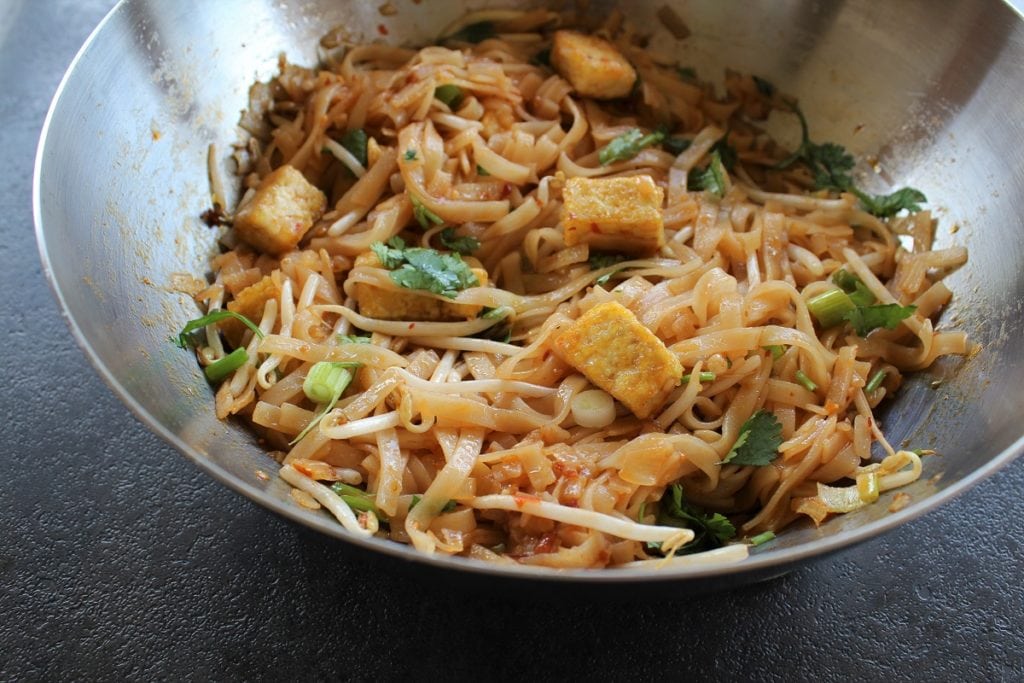 pad thai noodles in a wok