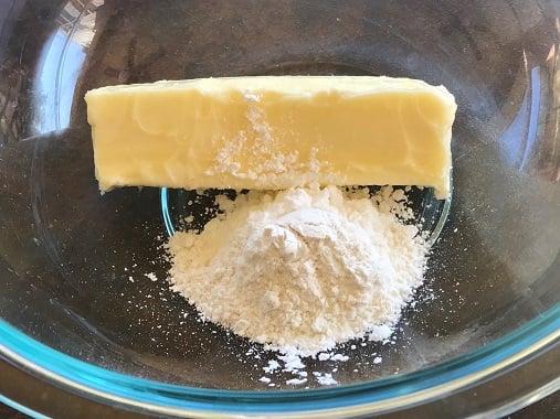 butter and powdered sugar in a large bowl