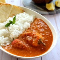 oconut bell pepper curry served with nan and rice