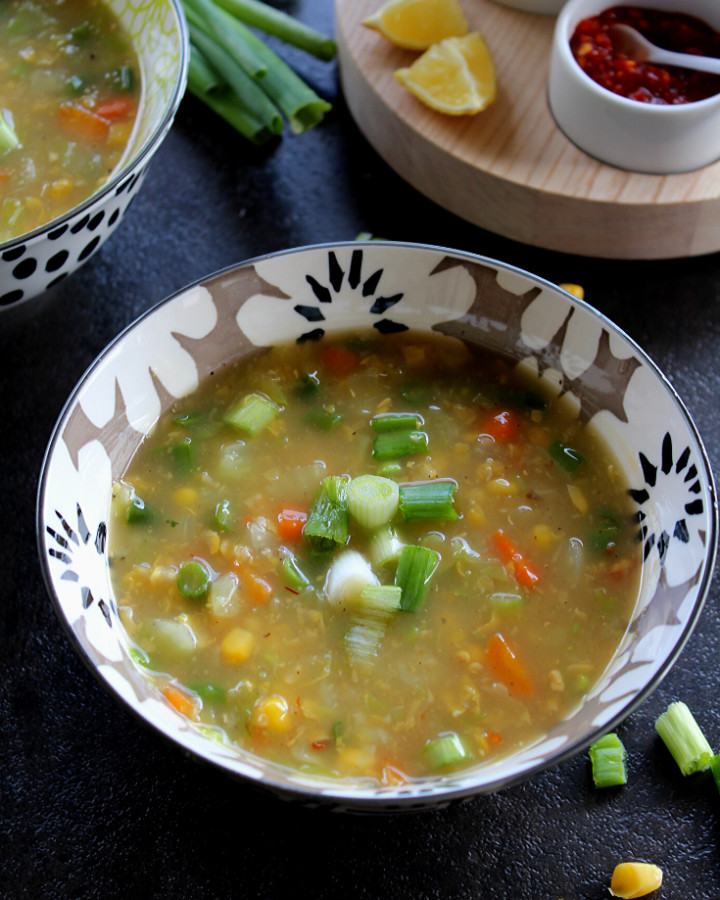 indo chinese style corn vegetable soup served in a bowl