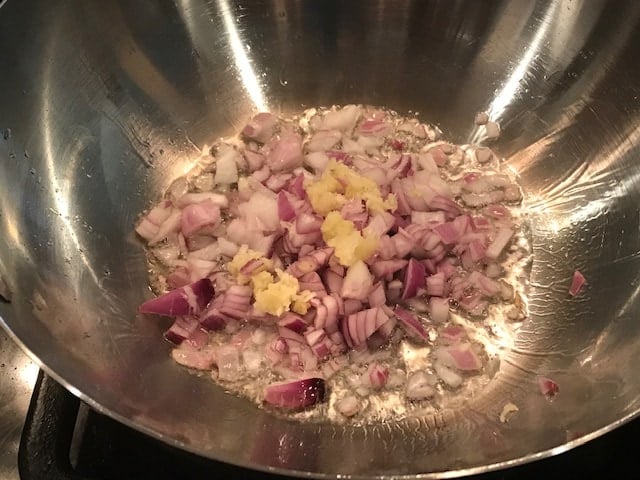 sauteing onion,ginger and garlic for fried rice