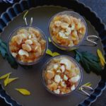 bread halwa served in small glass bowls with cashew