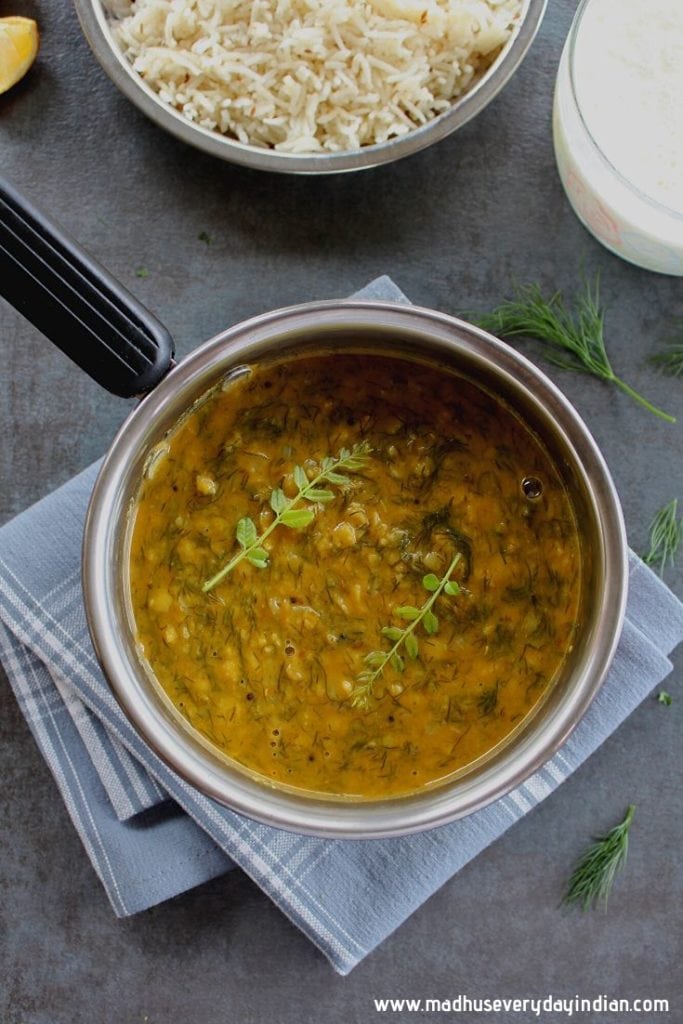 dill leaves toor dal garnished with curry leaves and served with rice and curd