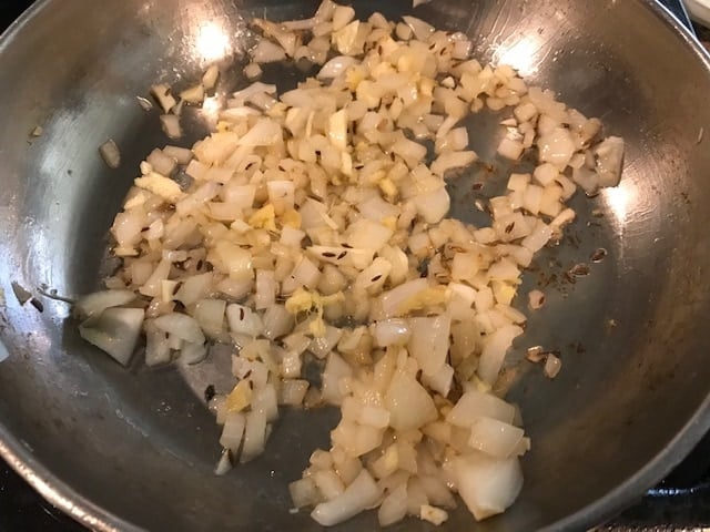 sauteeing onion, ginger and garlic