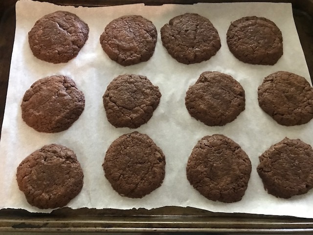baked nutella cookies lined in abking tray fresh out of oven