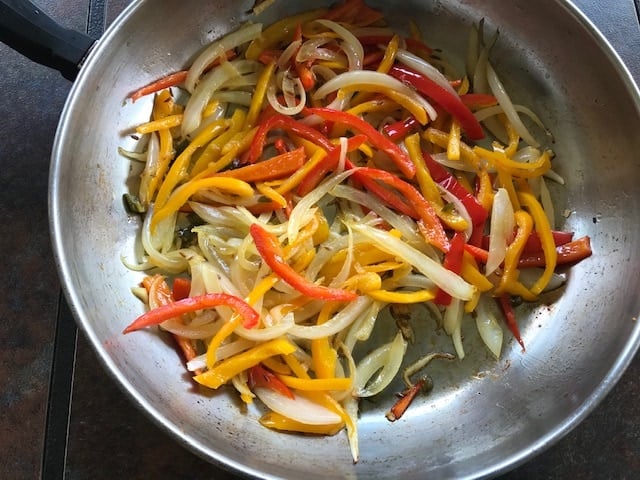 sauteed onion and peppers added to onion mixture