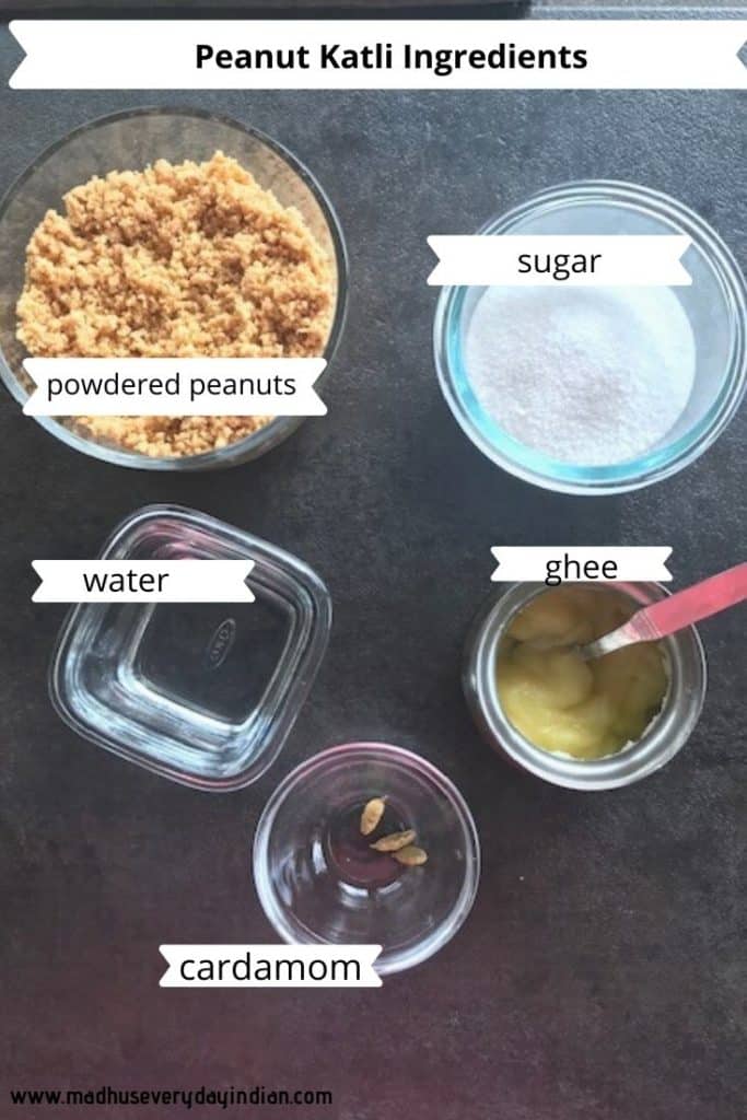 peanut powder, sugar, water, ghee and cardamom  placed in bowls