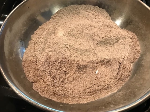pan fried ragi flour in a pan