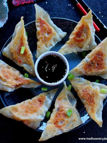 vegan potstickers swerved in a plate with dipping sauce