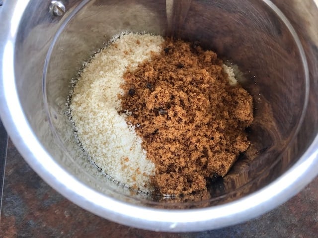 almond flour, jaggery and cardamom added to a blender