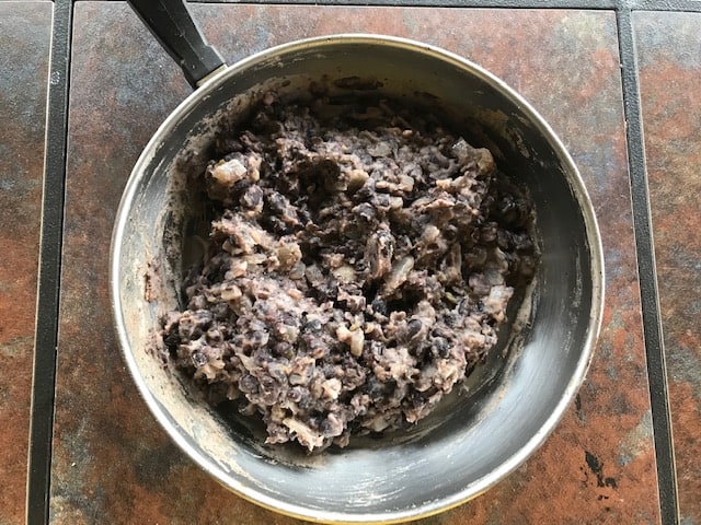 cooked black beans sauteed with onion and cumin powder