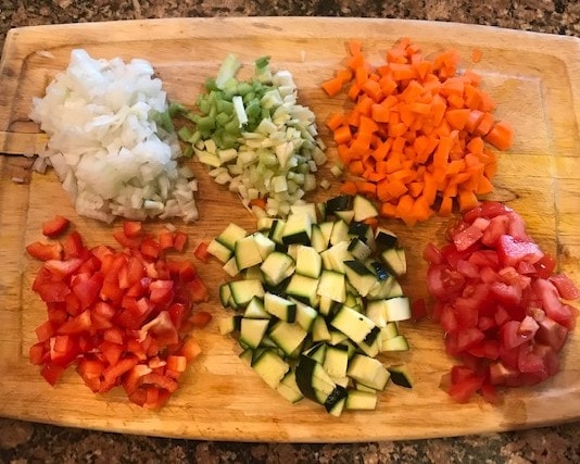 chopped onion, carrot, bell pepper, zucchini, and tomato