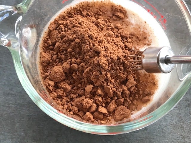 coco powder added to milk and maple syrup