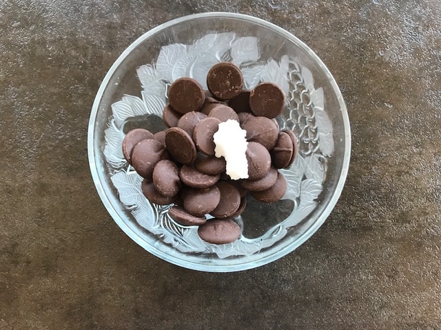 chocolate waffers and coconut oil in a glass bowl