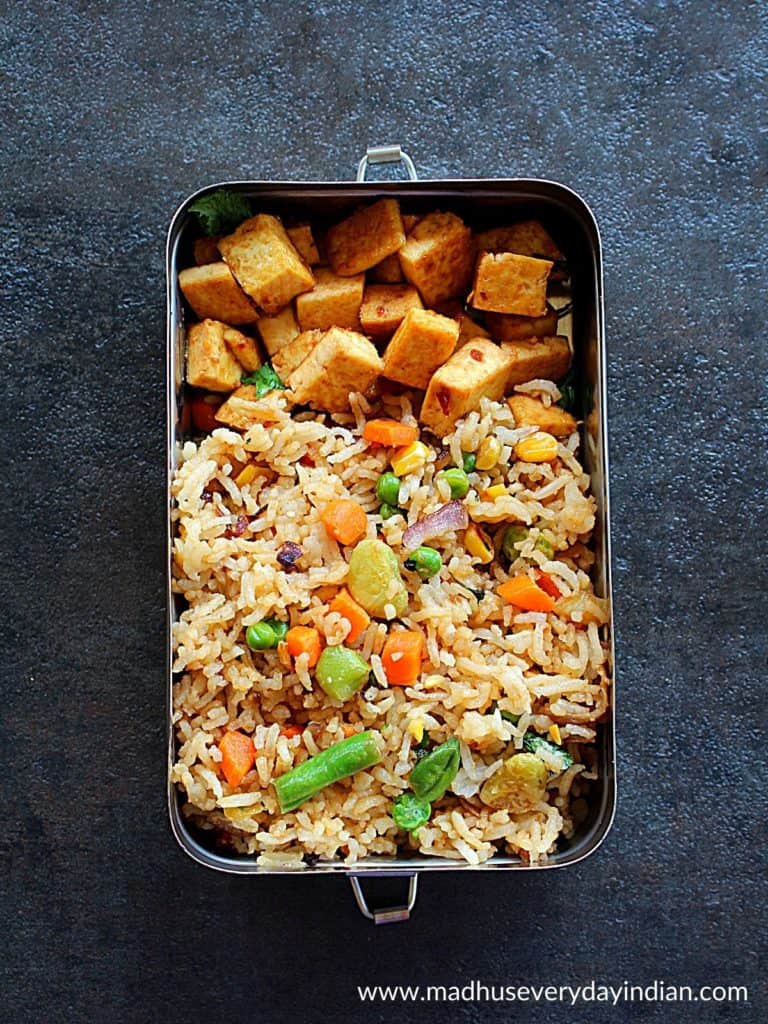 fried rice with tofu in a steel box