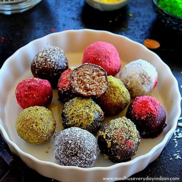 almond chocolate truffles arranged in a white plate