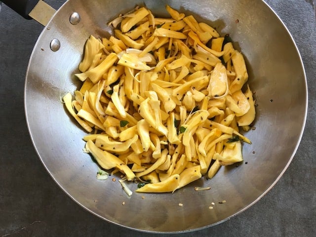 cooked jackfruit in a wok.
