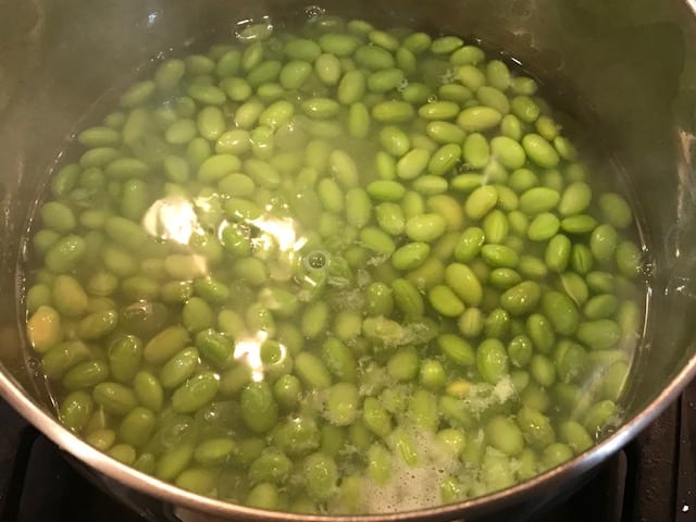 boiled edamame in water