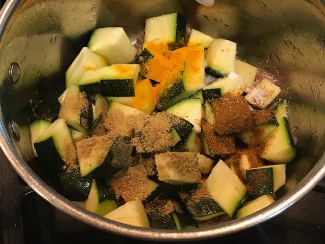 zucchini and spices are added.