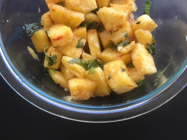 pineapple with chili powder and mint 
