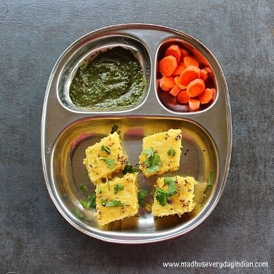 instant dhokla served with chutney and carrots