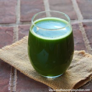 ash gourd green juice served in a glass cup