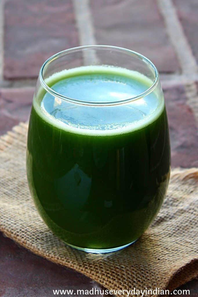 ash gourd green juice served in a glass cup