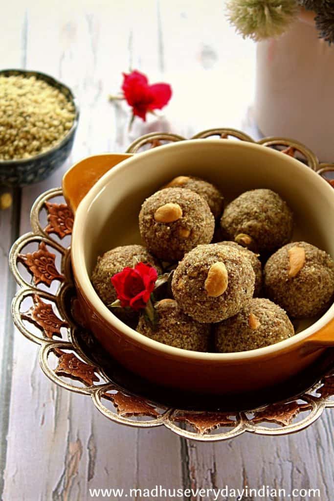 hemp hearts ladoo arranged in a bowl garnished with rose petals