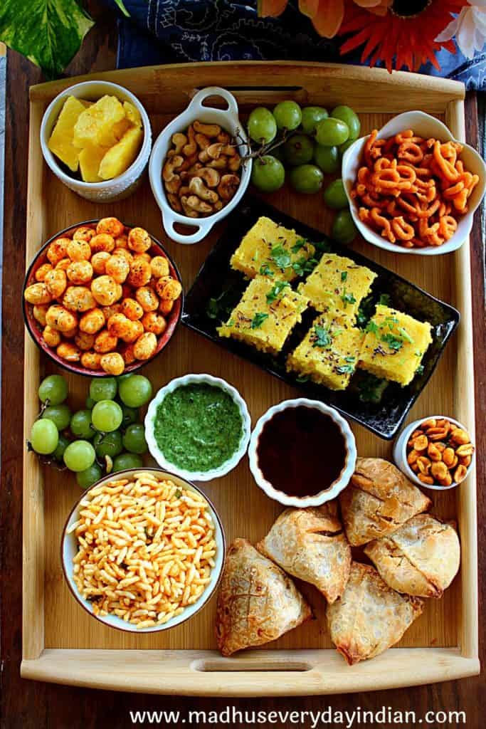 indian chaat cuterie board served with various snacks 