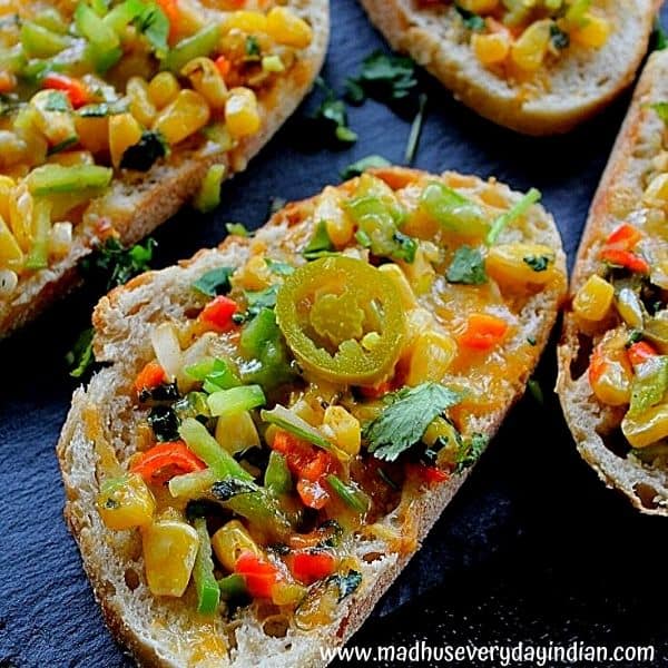 masala corn toast topped with pickled jalapeno