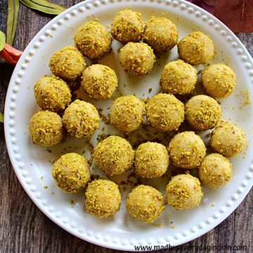 24 ladoo served in a big white plate