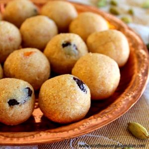 rava laddu made with condensed milk arranged in a plate