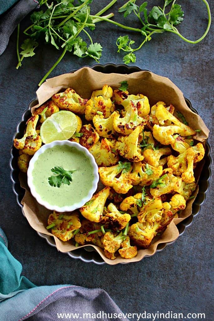 curry roasted cauliflower indian style served with a dip