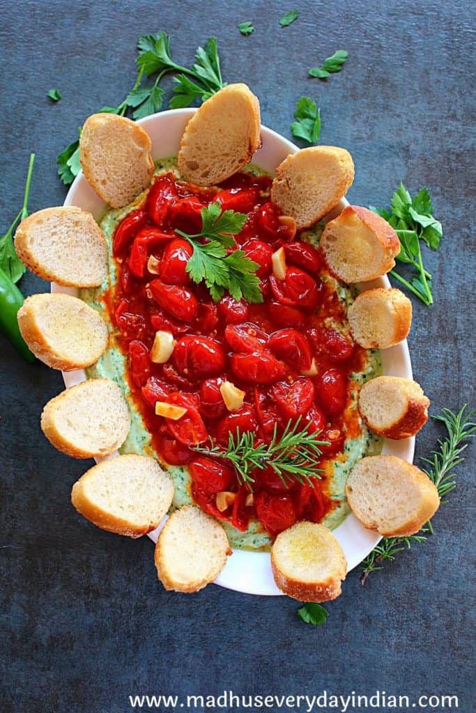 spicy ricotta dn roasted tomato served with baguette slices