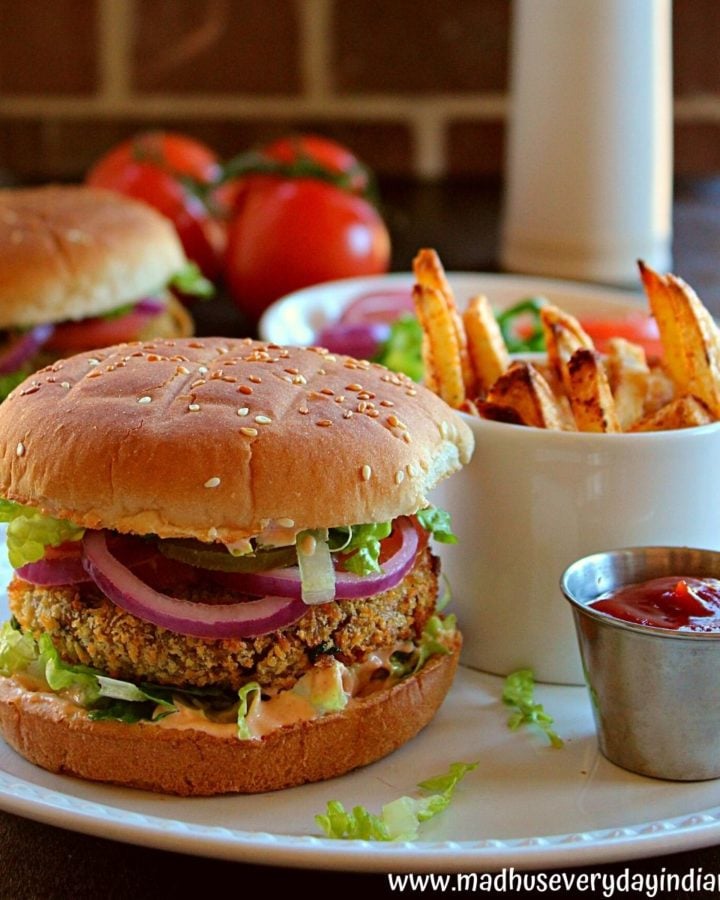 indian style veggie burger served with masala fries and ketchup