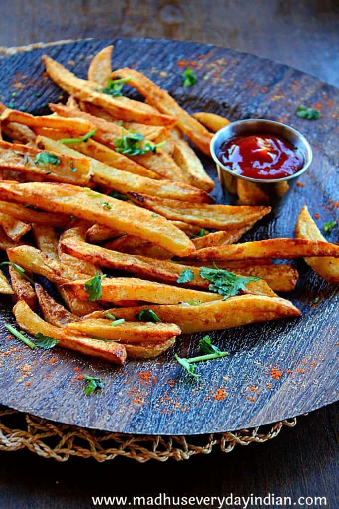 masala fries served with ketchup