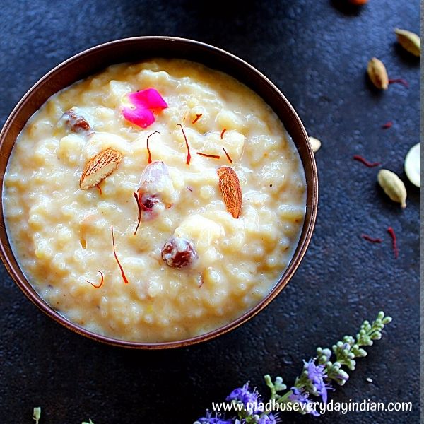 rice kheer garnished with nuts and rose petals