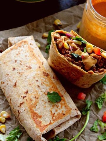 2 lentil burritos served with chipotle sauce