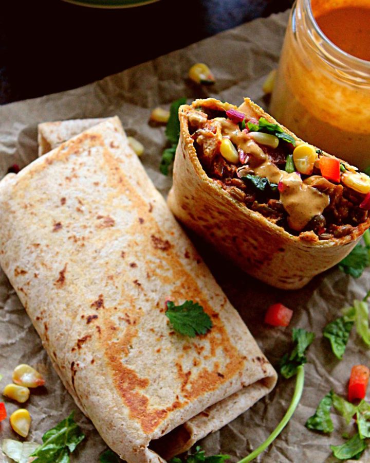 2 lentil burritos served with chipotle sauce