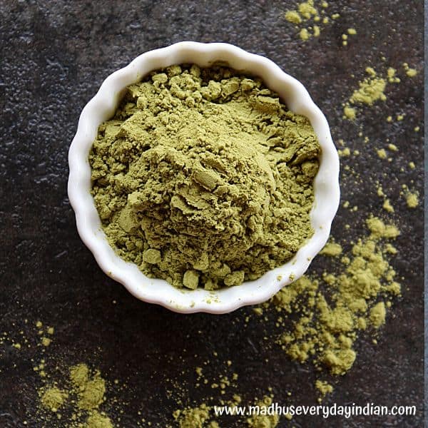 picture of moringa powder in a white cup