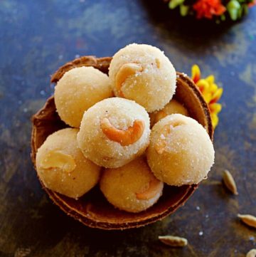 soft rava ladoo served in a coconut shell