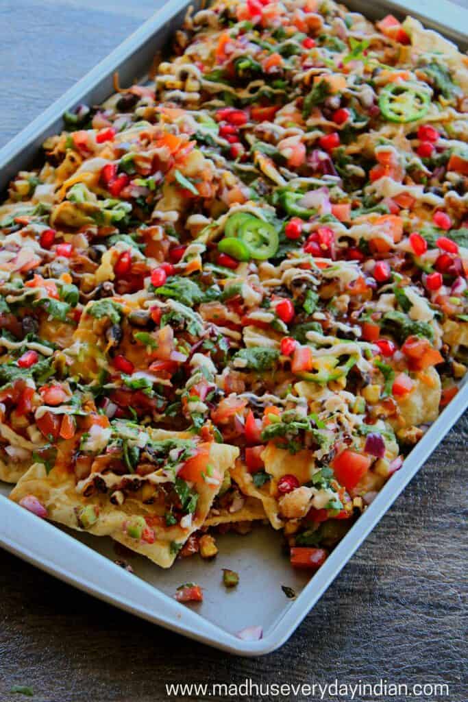 indian style nachos served in a baking tray