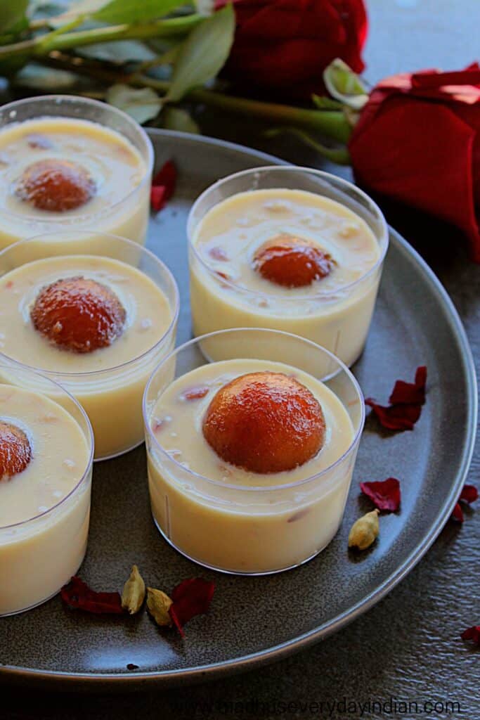 rabdi served in clear cups with gulab jamun